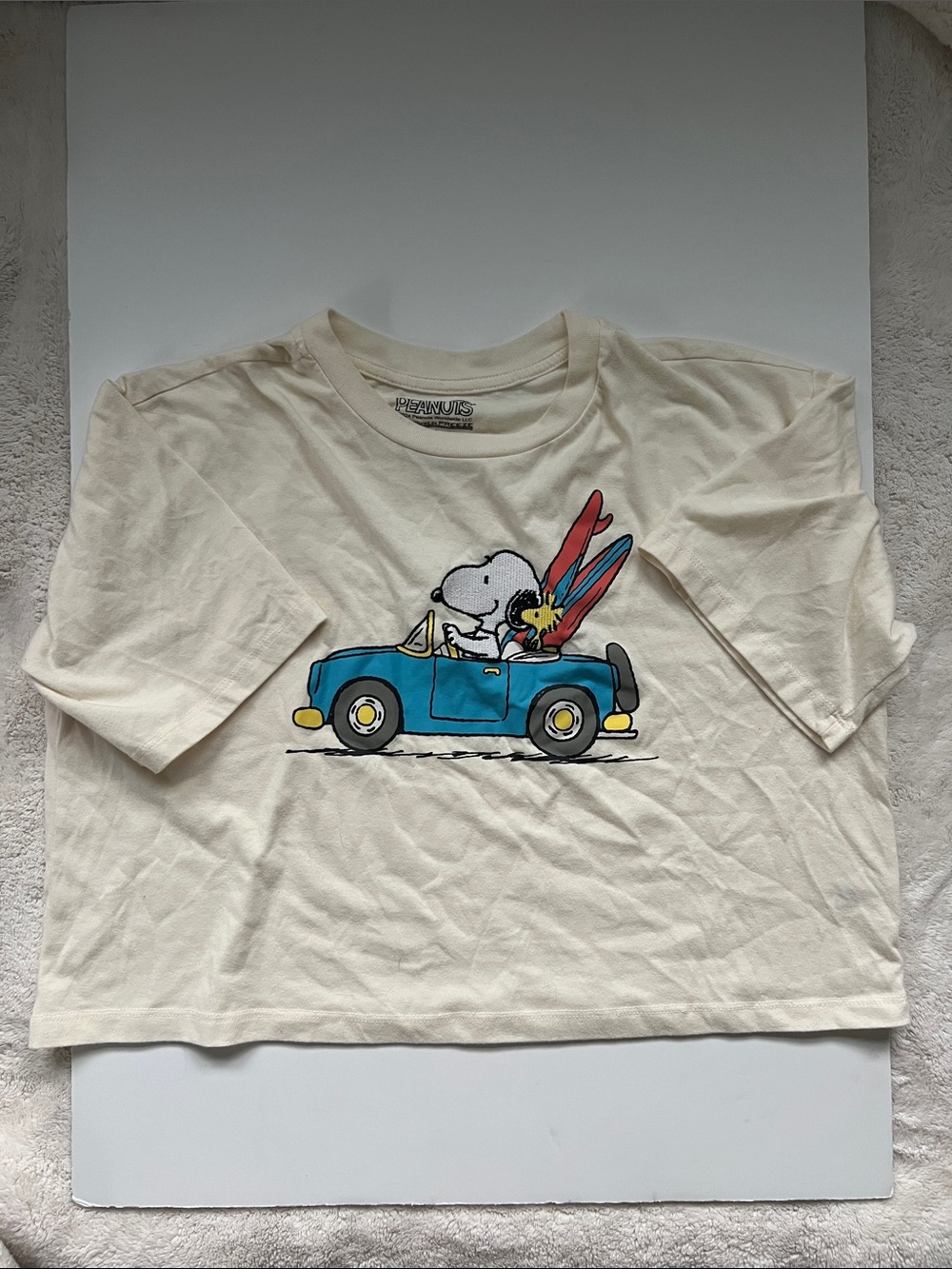 Cream Peanuts Graphic Tee with Blue Car and Red Surfboards